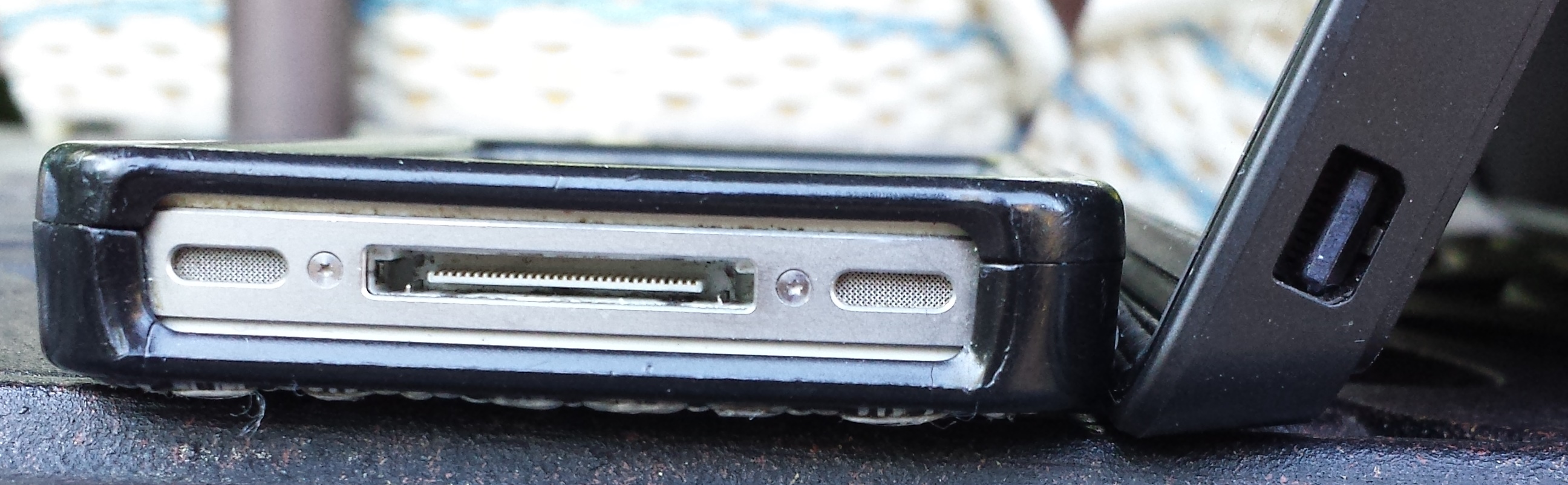 Surface Pro Mkni Display Port on right with iPhone on left for perspective.